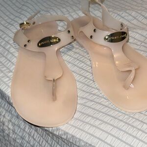 Michael Kors Pale Pink Jelly T-Strap Sandals with Gold Plaque